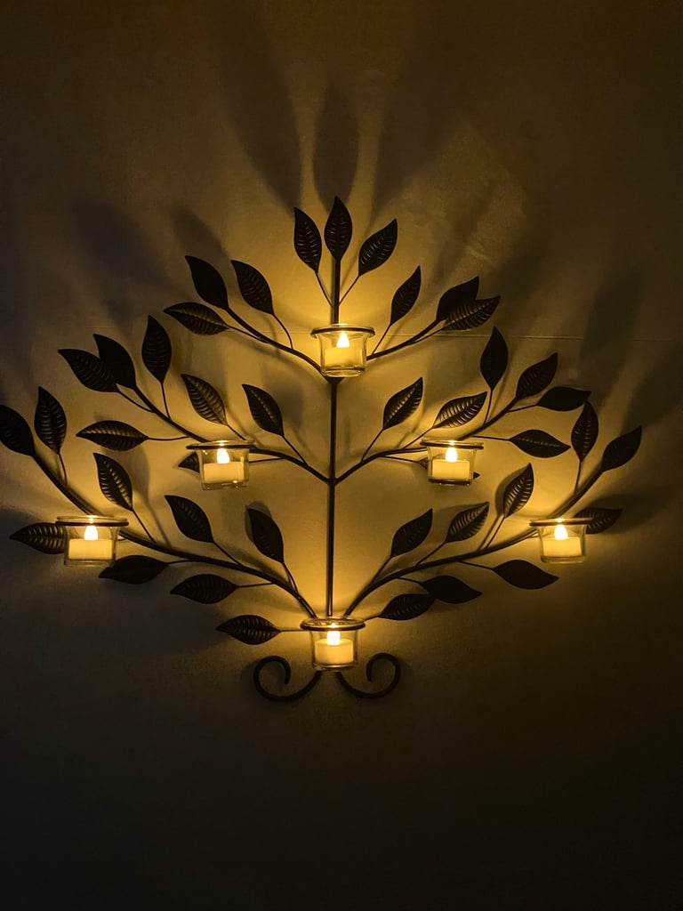 Tea light holder and wall art.