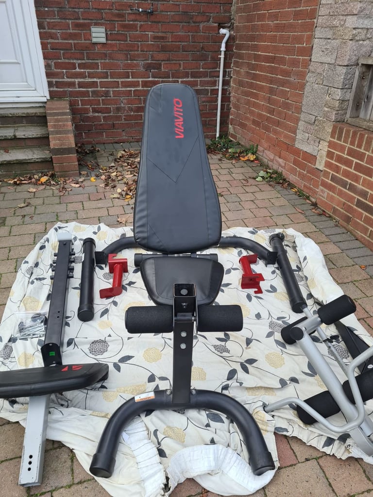 Adjustable weight bench and barbell rack 