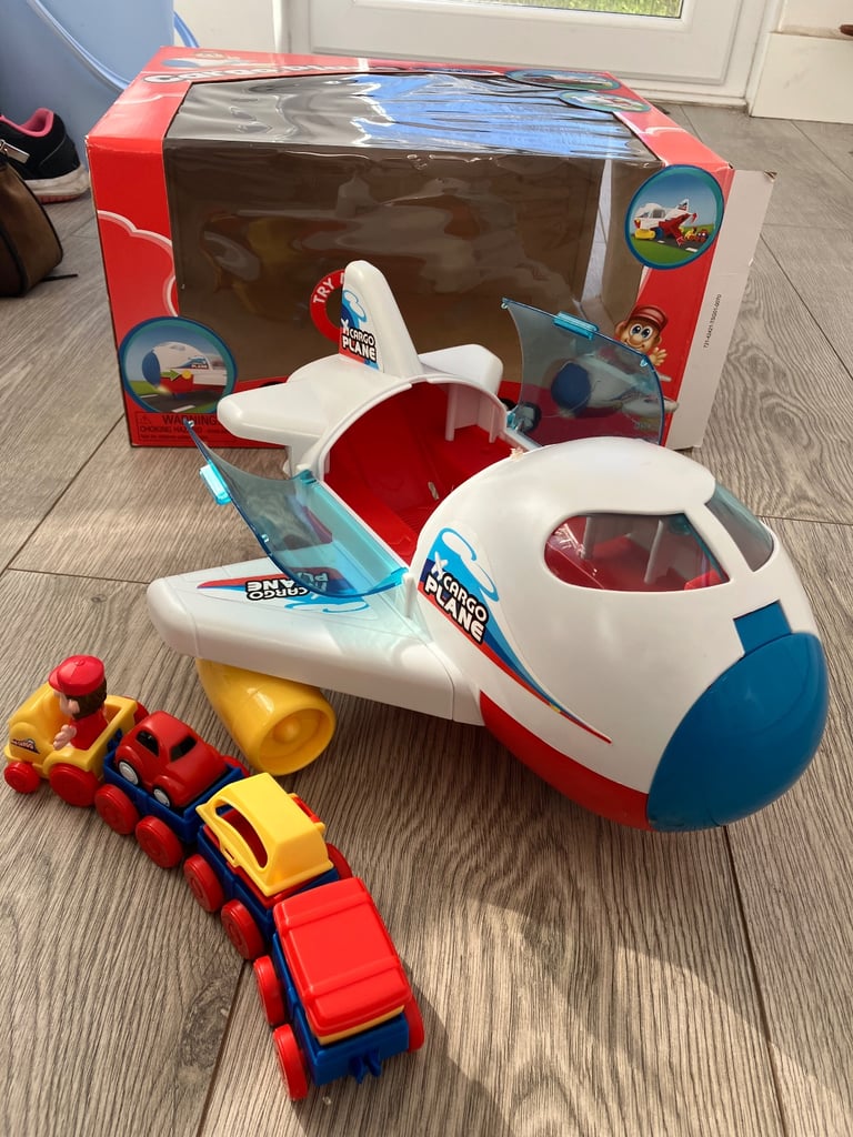 Cargo plane with train in box