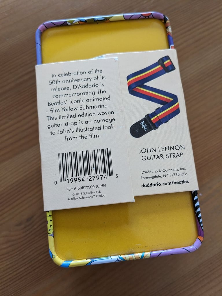 The Beatles D'Addario 50th anniversary guitar strap John. Collect Leeds LS13