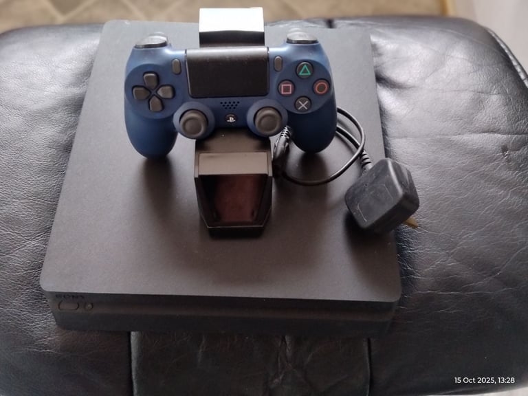 image for Playstation 4 with controller & charging dock.