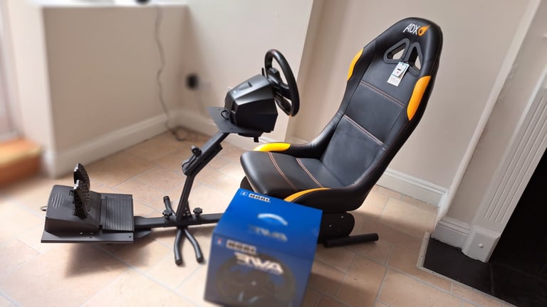 Brand new Ps5 racing car seat and steering wheel and pedals 