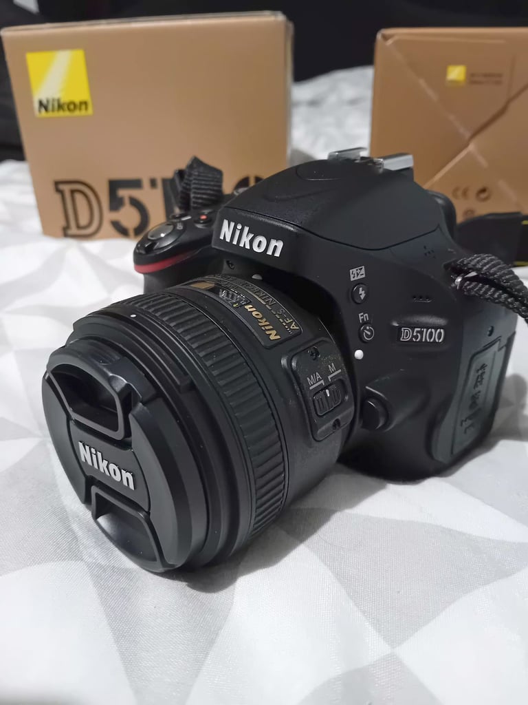 image for Nikon D5100 DSLR DX Format Camera plus 50mm F1.8G Lens