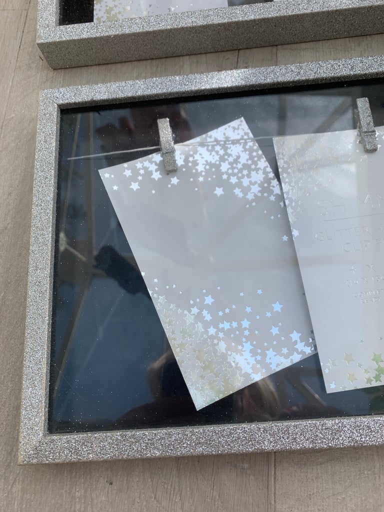 New/ unused multi photo frames silver sparkle rectangular