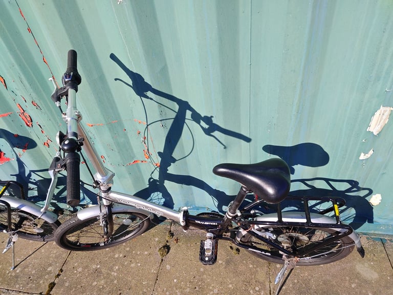 Apollo Transition folding bikes with bags