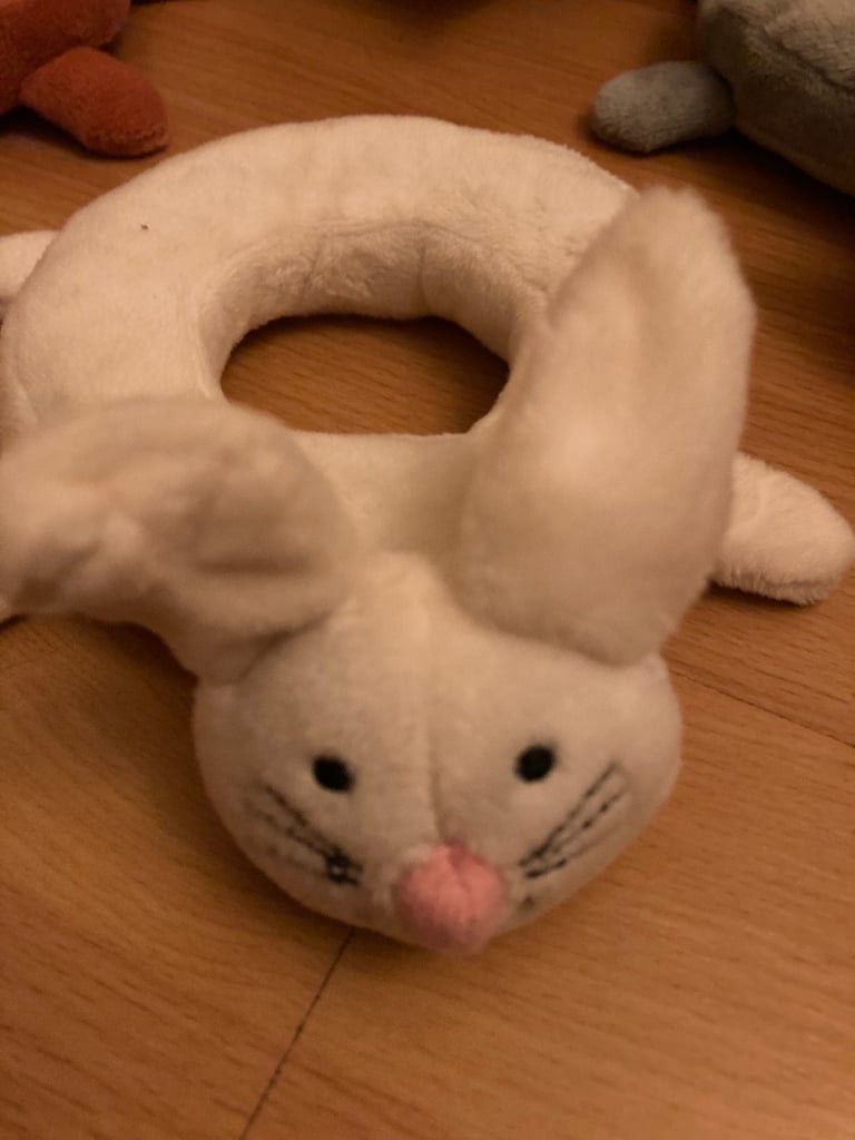 Selection of soft toys inc Peter rabbit bunny, giraffe, Winnie the Pooh and animal stacking ring