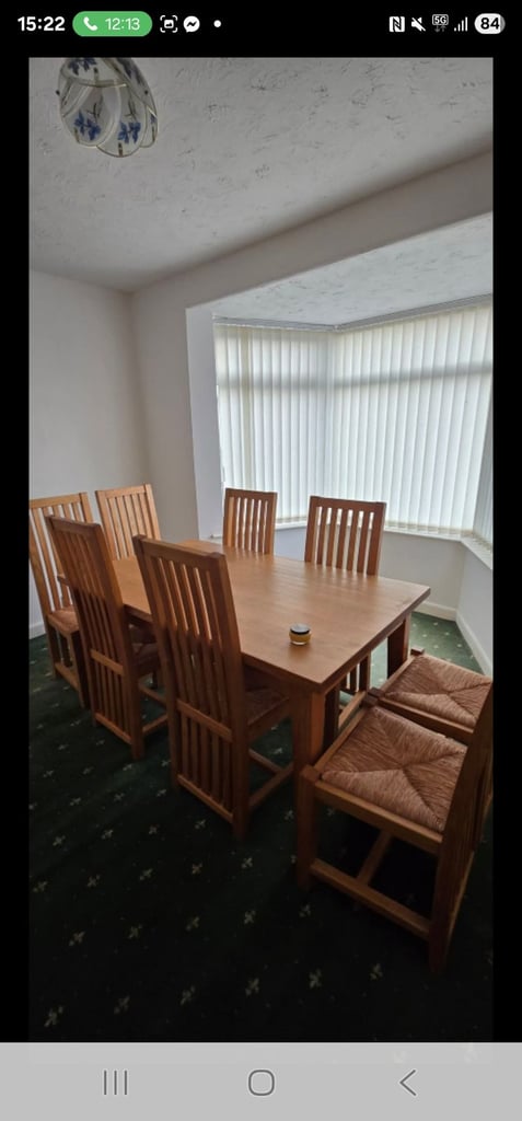 8 seather dining room table and chairs