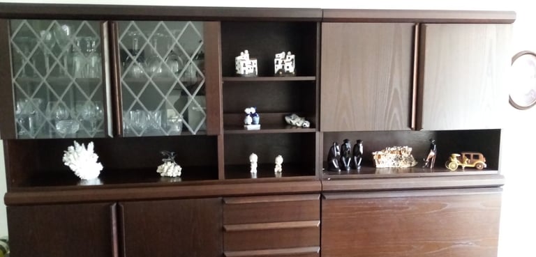 Dark brown storage/ display/ cocktail bar combination wall cabinet.