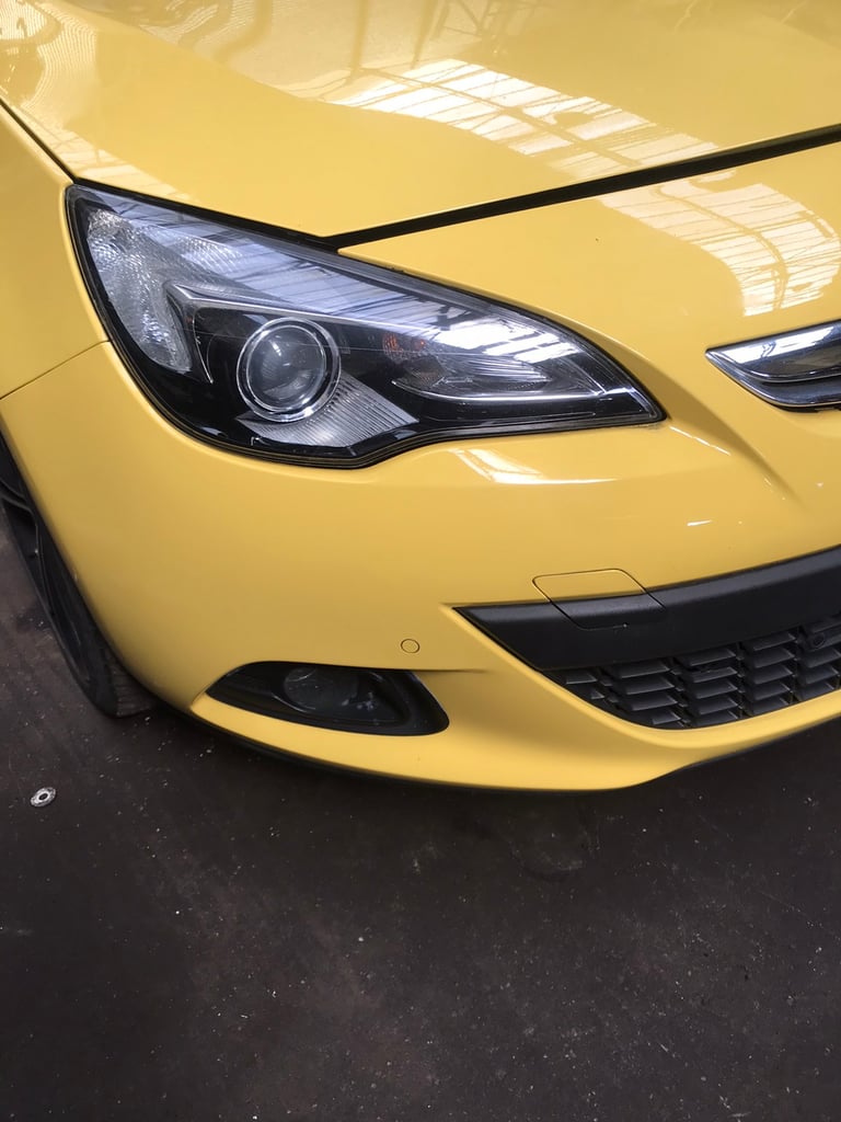 Vauxhall Astra GTC. FRONT Bumper. Complete yellow. 