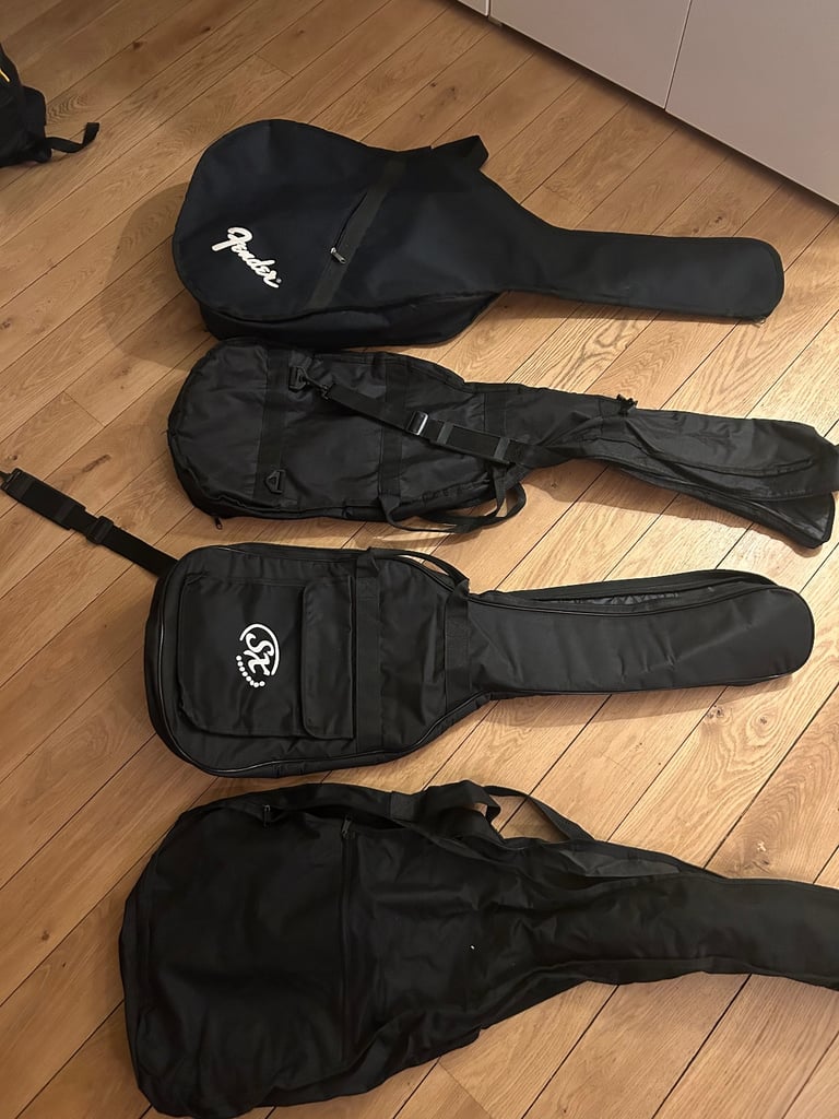 Free - 4 guitar/electric guitar cases 