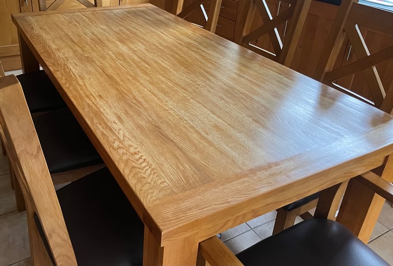 Solid Oak 8 seater table and chairs 
