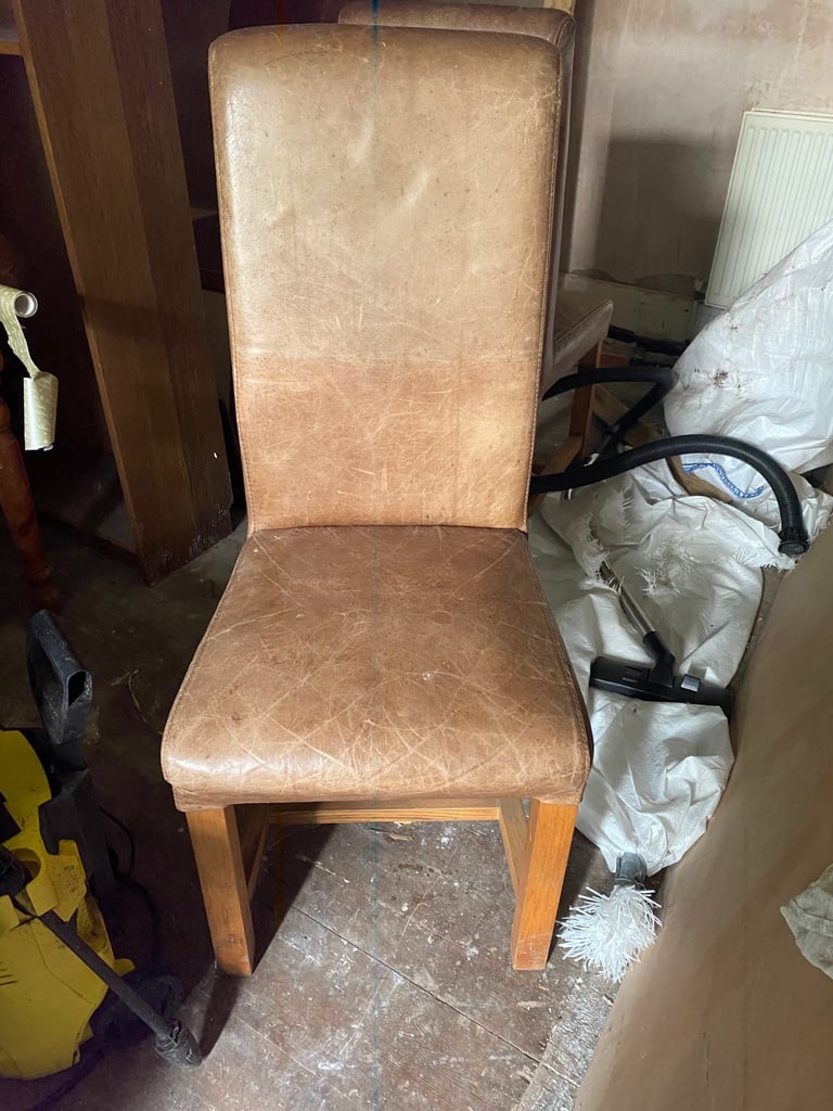 4 Tan leather and wood dining chairs