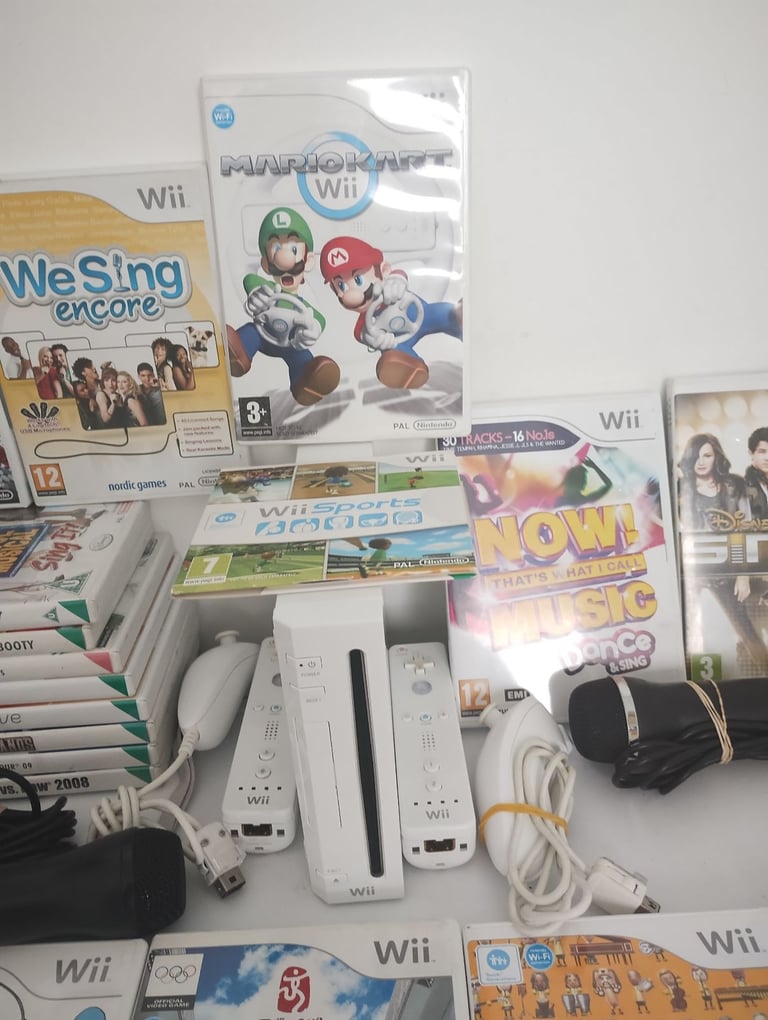 Nintendo Wii With 24 Games And Accessories In Good Condition And Perfect Working Order £100