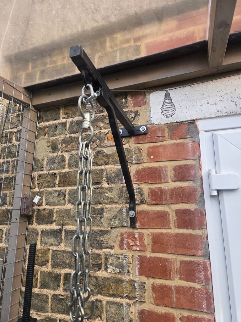 Punch bag and wall bracket