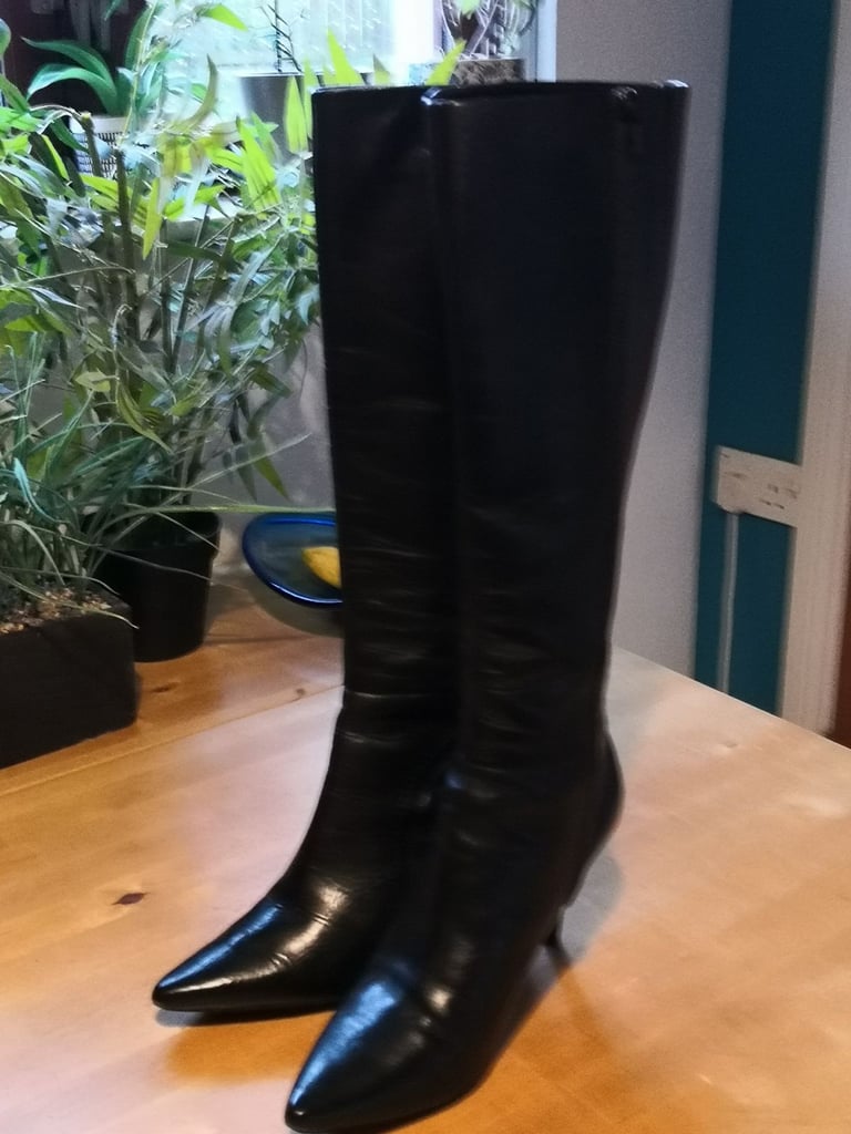 Real leather high heeled boots by M & S £10