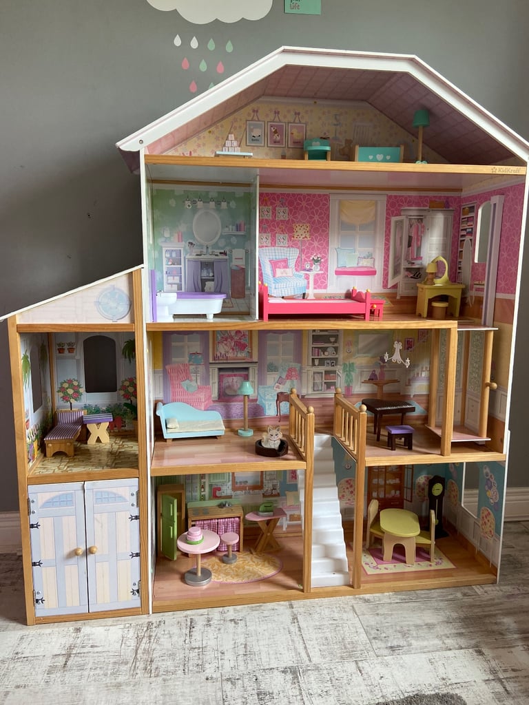 Large wooden dolls house (furnished) great condition