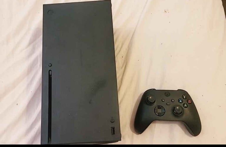 image for Xbox series x with one controller and wires