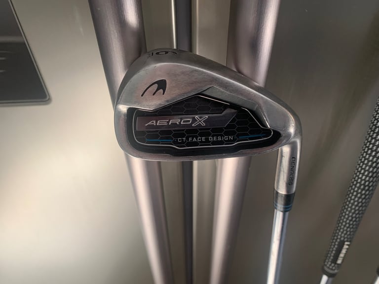 Set of golf clubs with new bag and nearly new irons