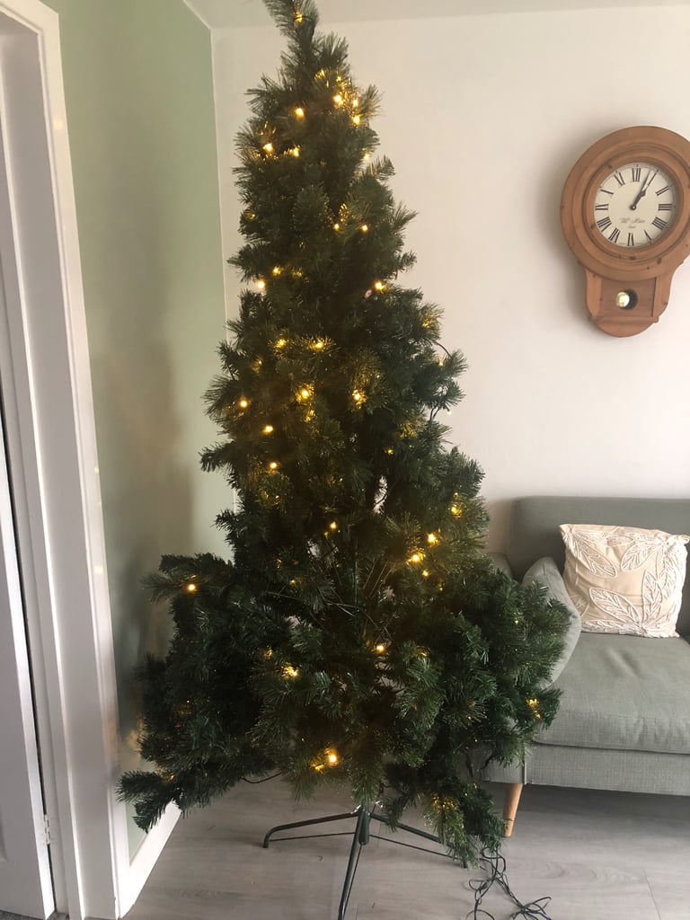 Pre-lit Majestic Dew Pine Christmas Tree complete with storage bag