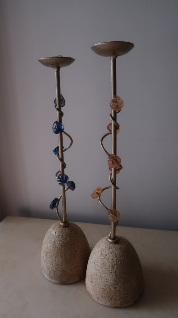 Candle holder, brand new, orangish pink and light blue resin leaves as decorations