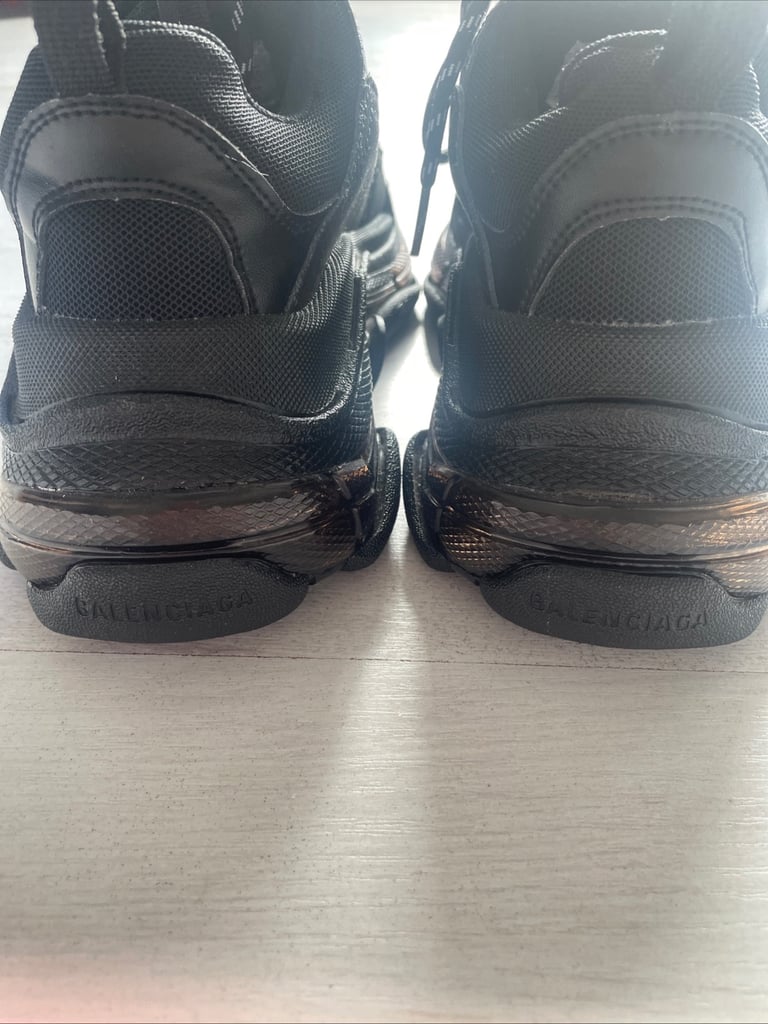 Black balenciaga triple s trainers 