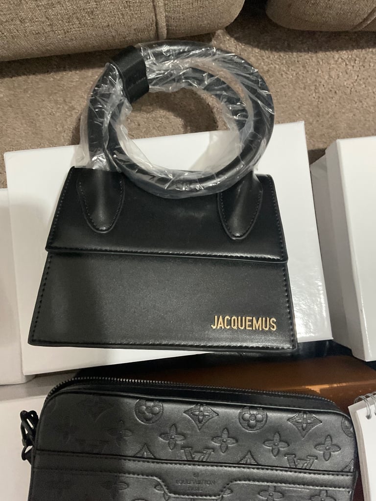 Assortment of designer women’s handbags