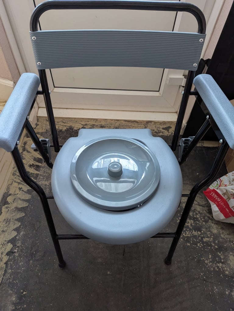 image for Drive folding commode. Never used
