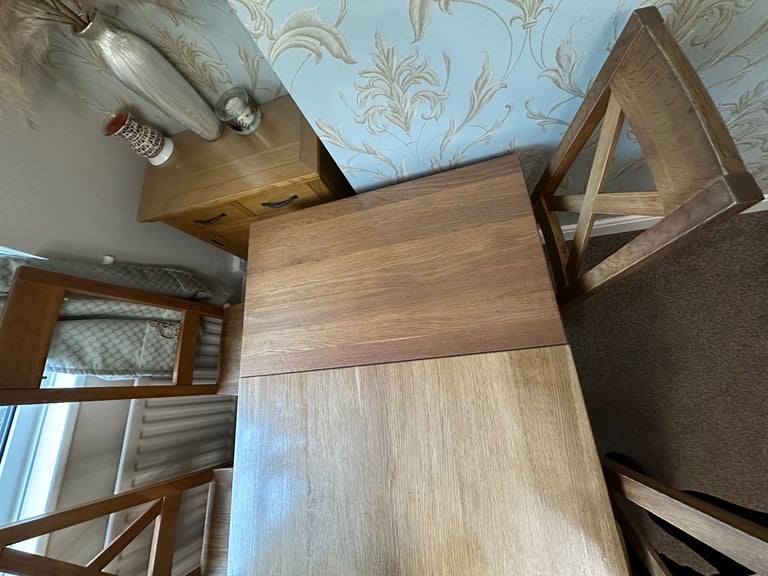 Oak dining table and chairs