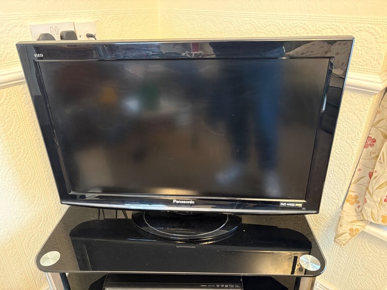 image for Tv and tv stand 