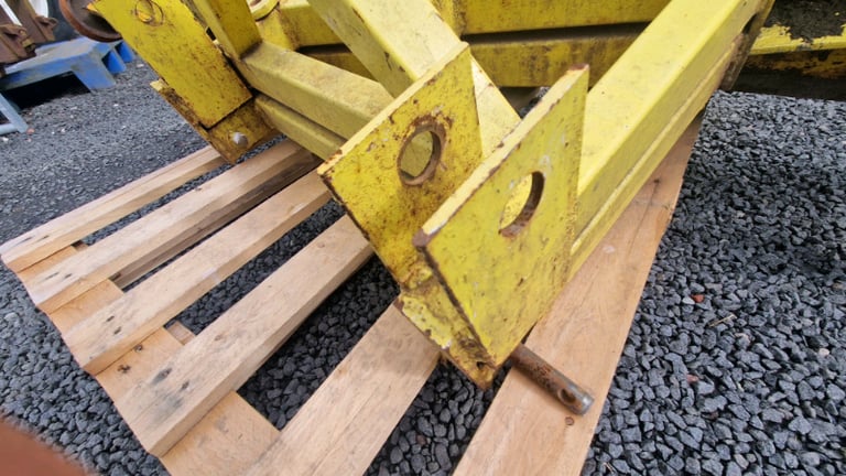 Tractor three point linkage angled snow spring loaded 