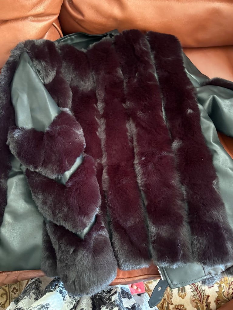 Brand new women’s biker style jacket with premium faux fur 