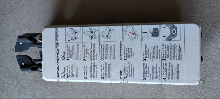 2 travel cots, sold separately
