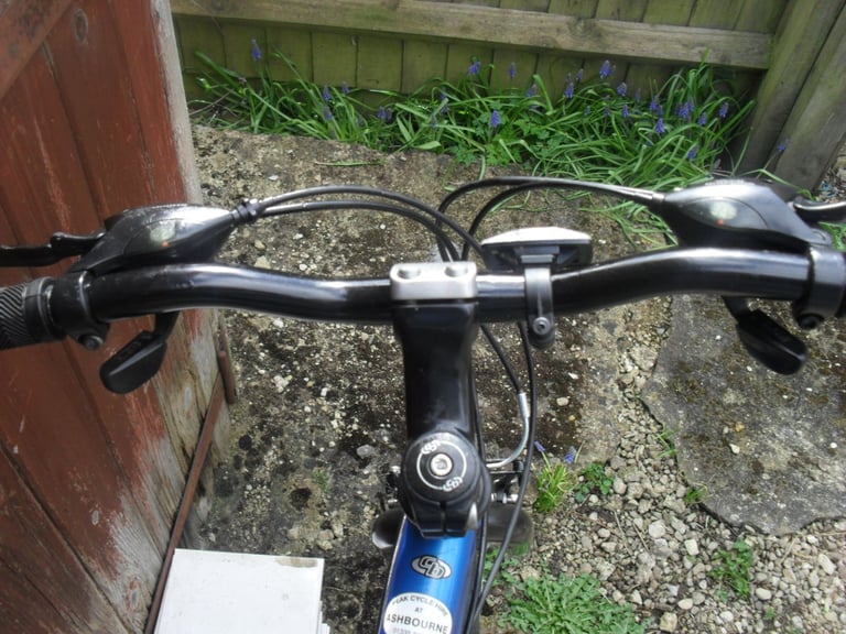 CLAUD BUTLER ADULT HYBRID BIKE.