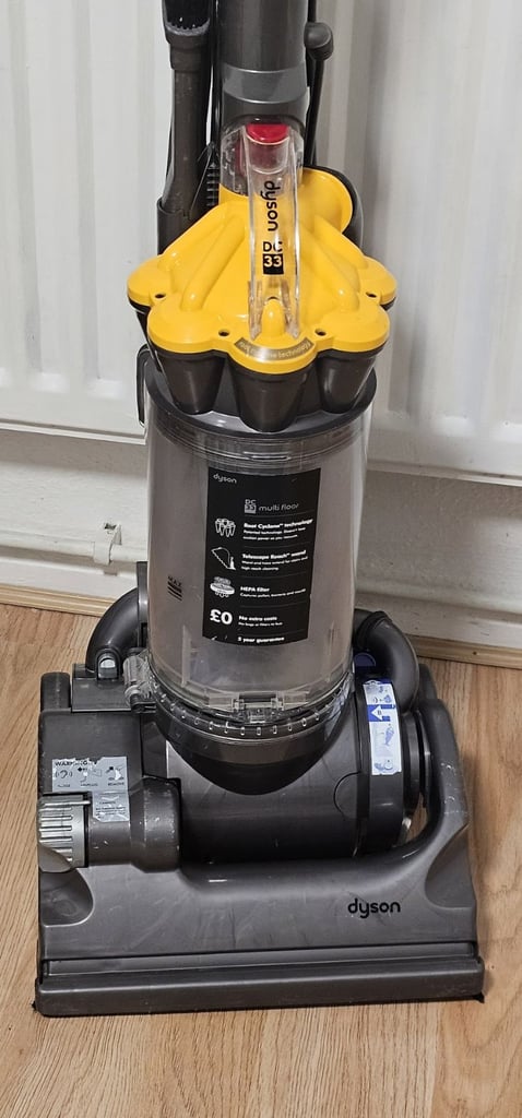 Dyson DC33 upright vacuum cleaner with tools, brand new motor
