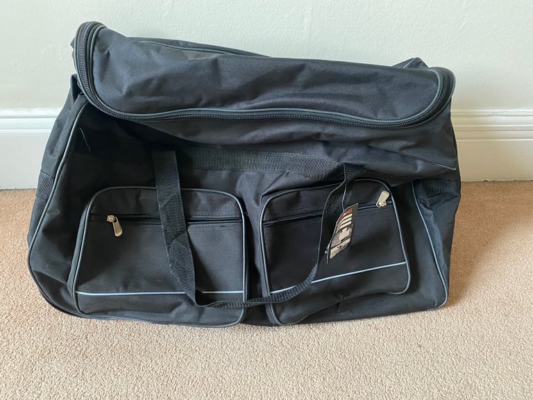 Hold-all with wheels