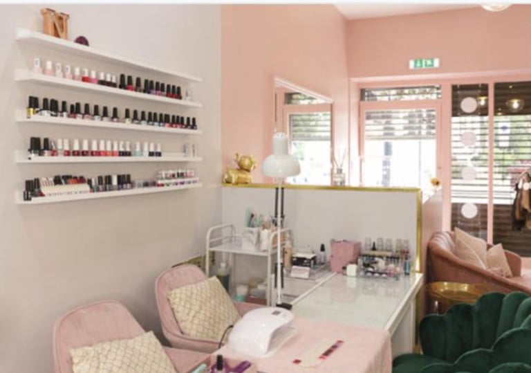 image for Beautiful Nail station inside busy hair salon 