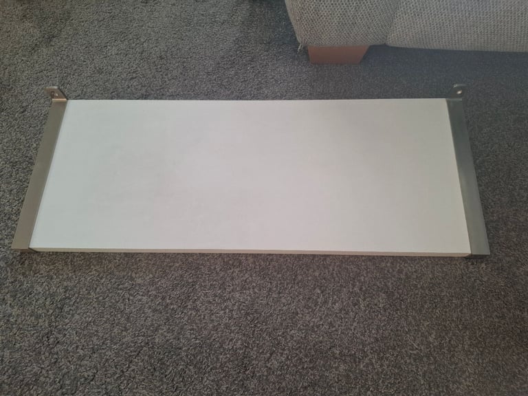 White shelf and brackets