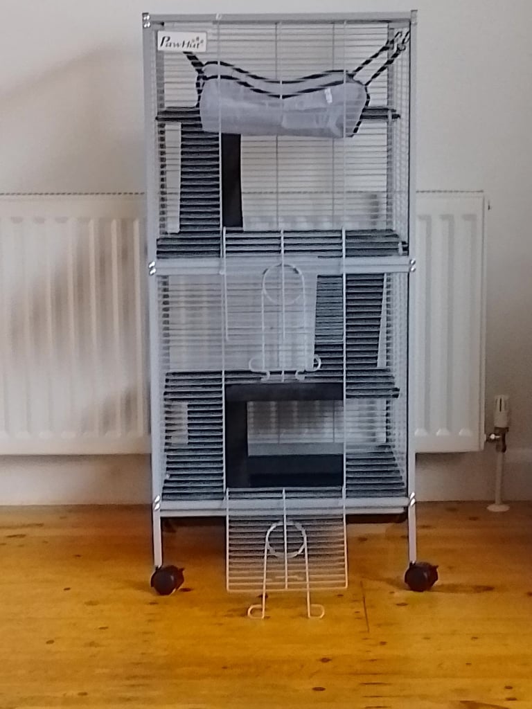 4 tier animal cage on wheels. 1 week old.