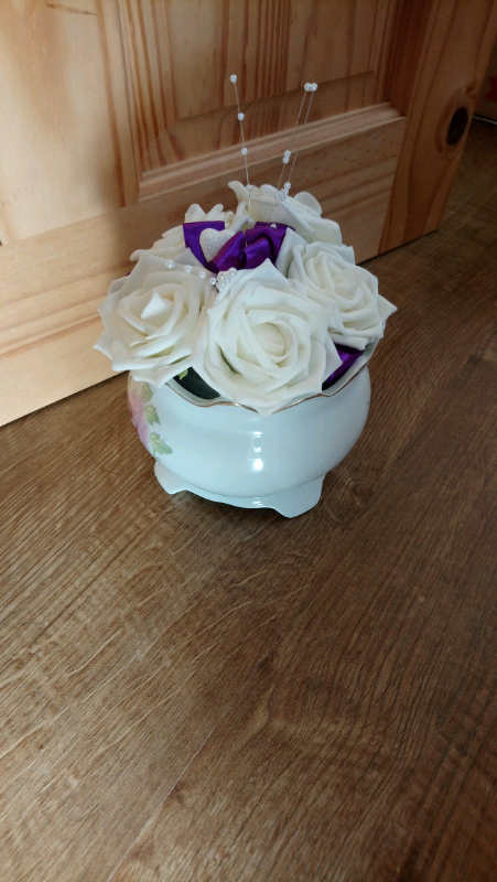 Vintage Pottery Vase with artifical flowers 