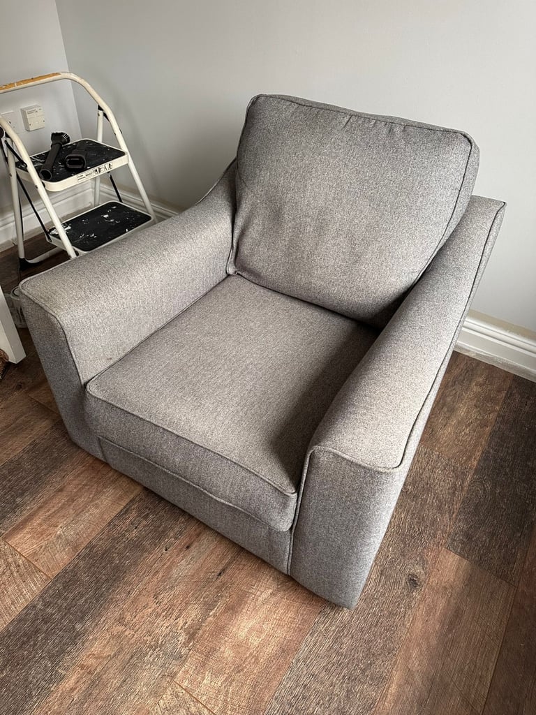 DFS grey armchair 