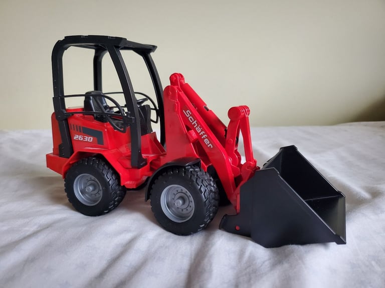 Bruder Farm Vehicle Digger With Hay Bale