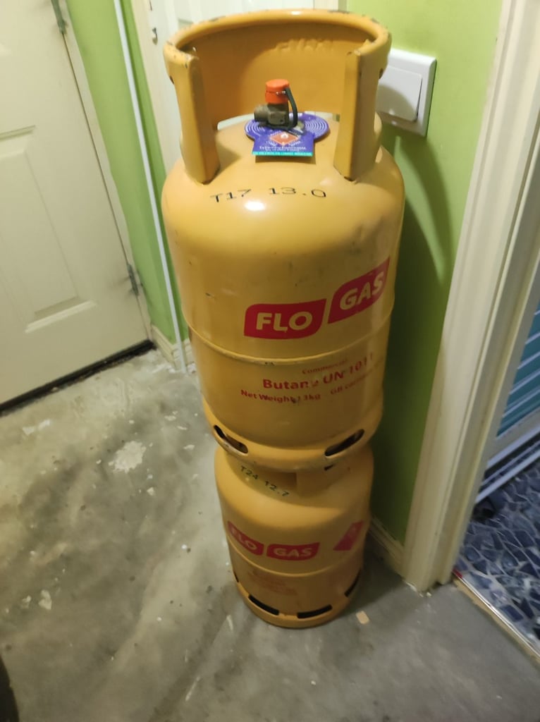 Gas depot , portable gas heater on wheels, plus 2 flo gas canisters 