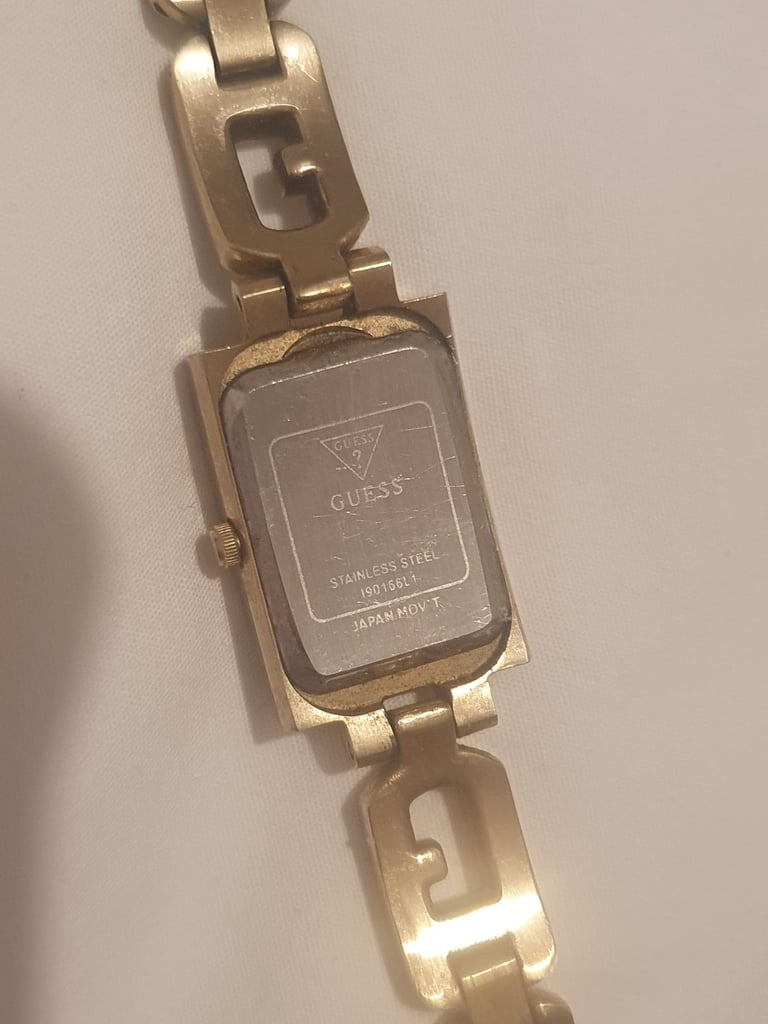 Gold guess watch