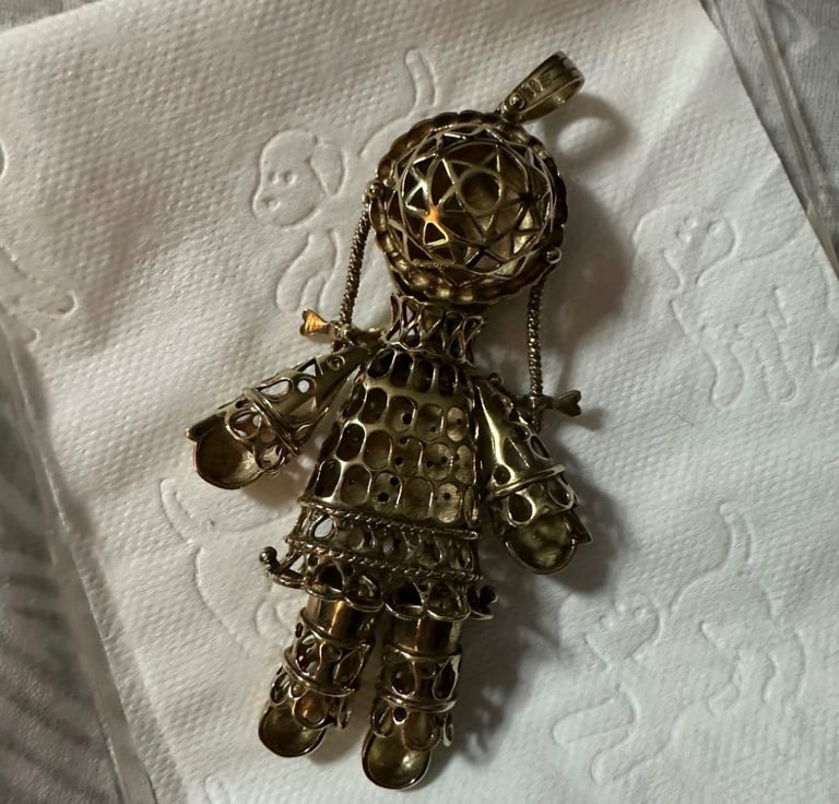 9ct yellow gold over 925 sterling silver rag-doll pendant with lovely detailing and stones.  