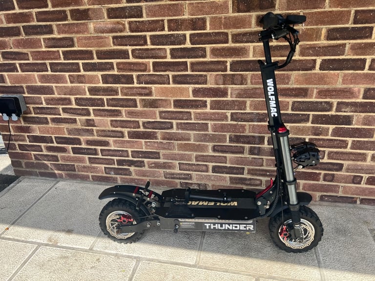 Wolf H9 Atv all terrain military grade 5200 watt e scooter 2 wheel drive 62 volt 60 mph