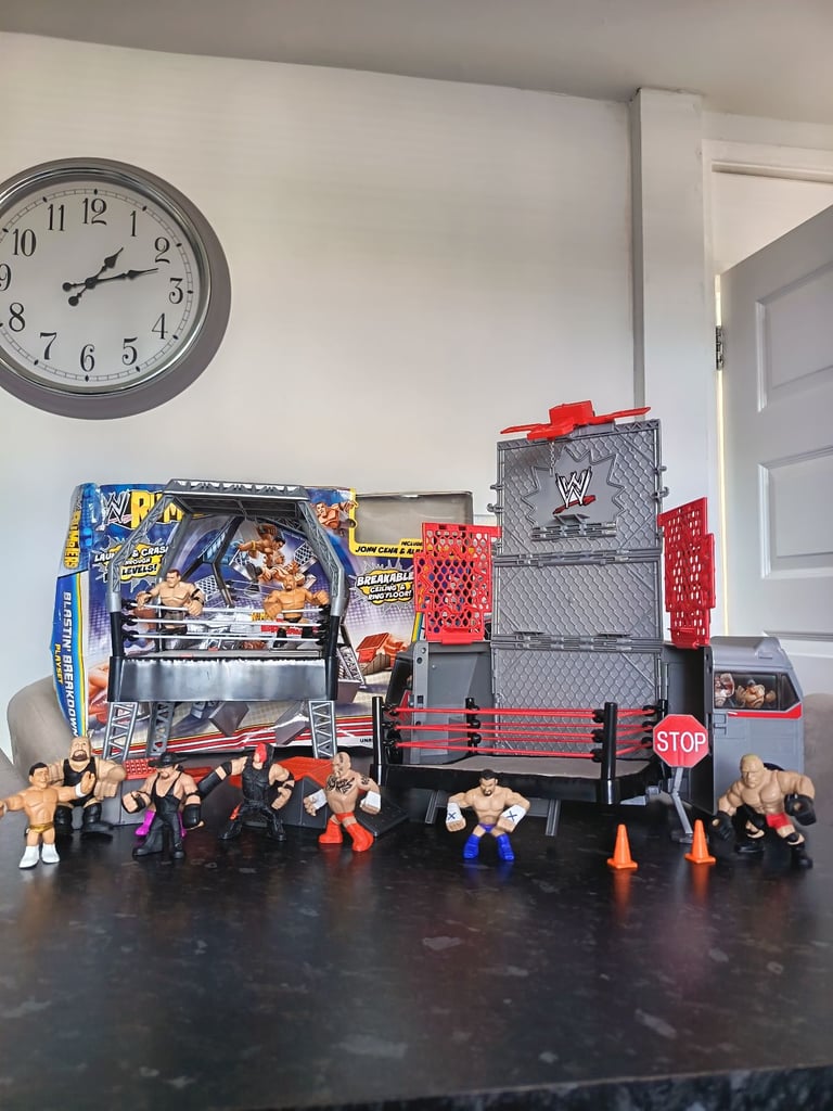 WWE playset & Rumblers rampage transforming tour bus.