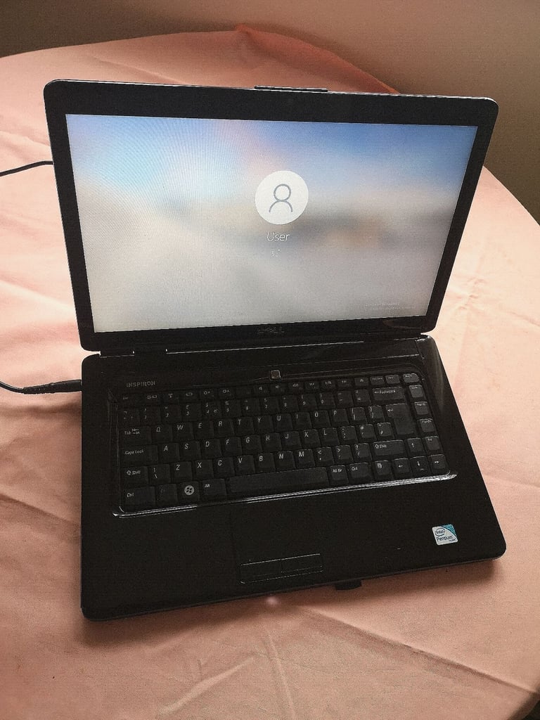 Dell Inspiron Laptop on Windows 10 with pink colour lid. . Pink colour. 