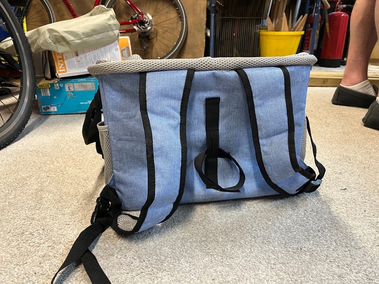 Dog carrier for bike or rucksack. 