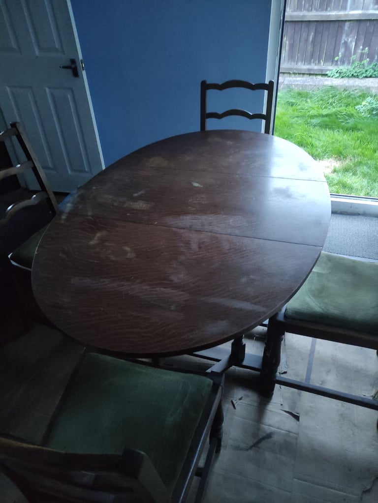 image for Folding Dining table and 4 chairs (Free delivery)