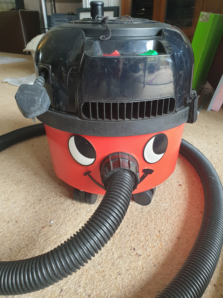 Henry vacuum cleaner with tools shown in photos